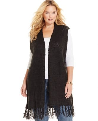 Woman wearing long black vest by Melissa McCarthy Seven7.