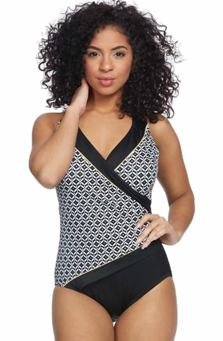 Tall woman wearing one-piece swimsuit