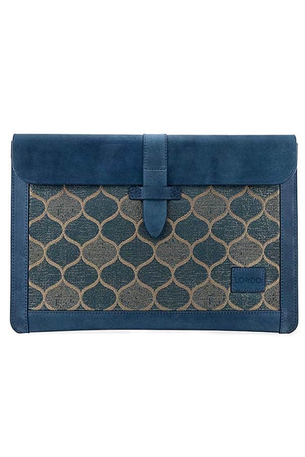 Leather laptop sleeve with blue and green design.