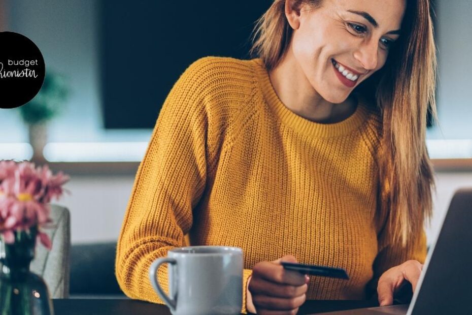 Woman smiling while shopping online