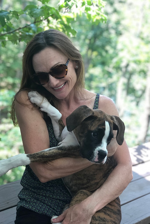 Catherine Brock and boxer puppy 