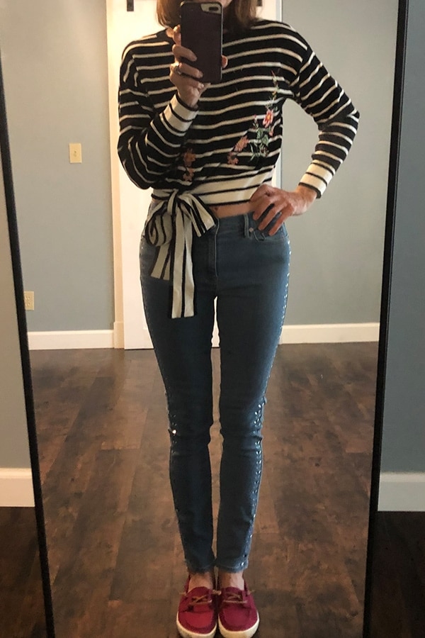 Catherine Brock wearing crop tie sweater