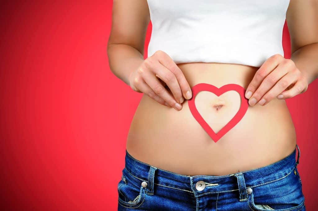 Woman showing bare midriff