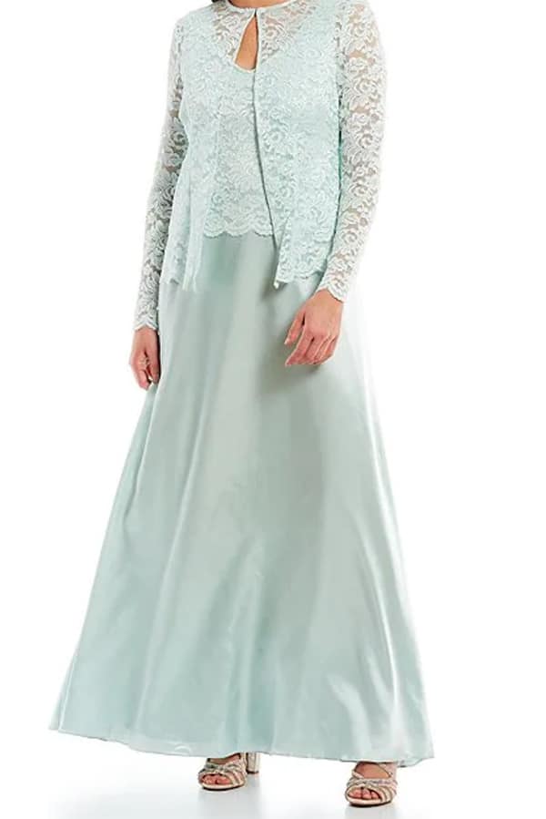 Model wearing mint green jacket dress from Dillards.