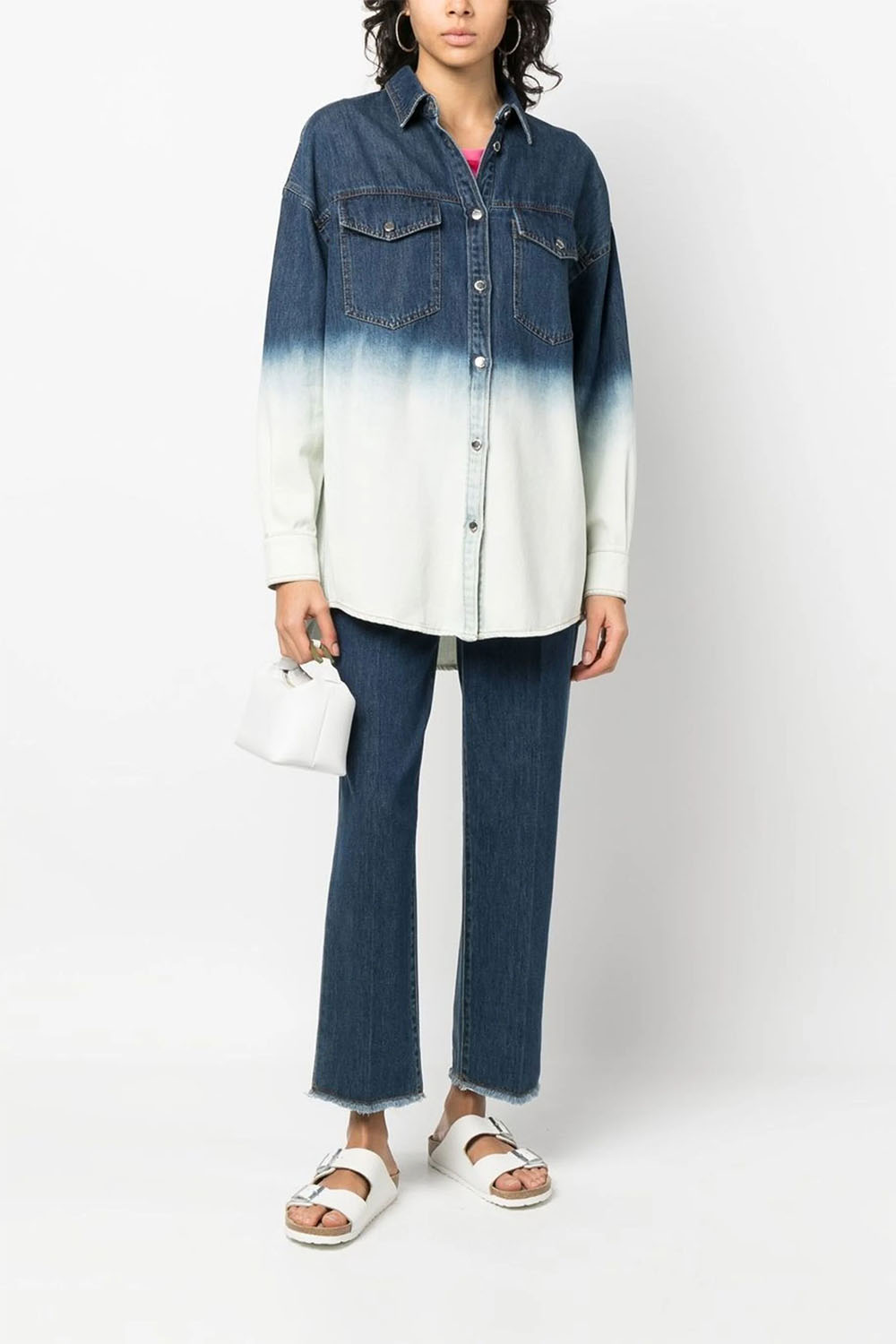 Model wears denim ombre shirt from Farfetch by Love Moschino.