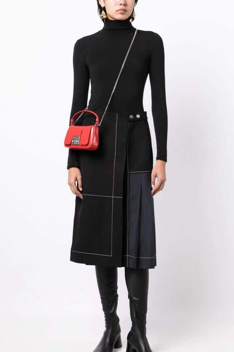 Mixed media midi skirt on sale at Farfetch.