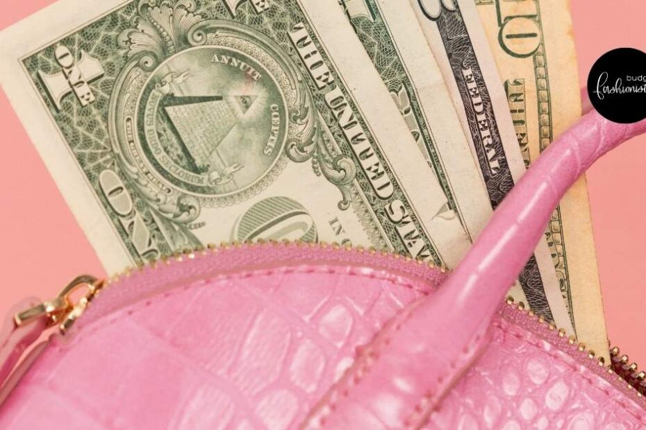 Pink purse with dollar bills inside