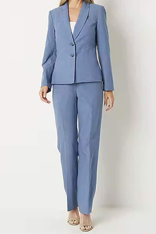 Model wears women's suit by Le Suit.