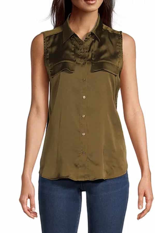Model wears olive green blouse.