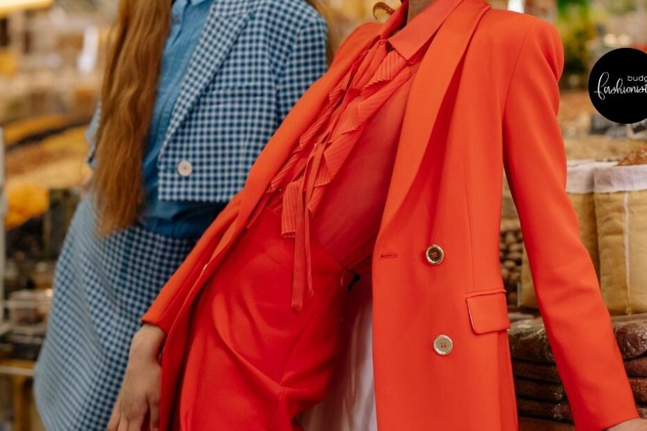Close-up view of fashionable woman wearing tomato-red outfit