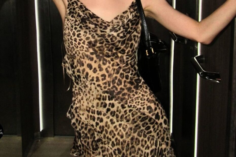 Woman wearing leopard print slip dress