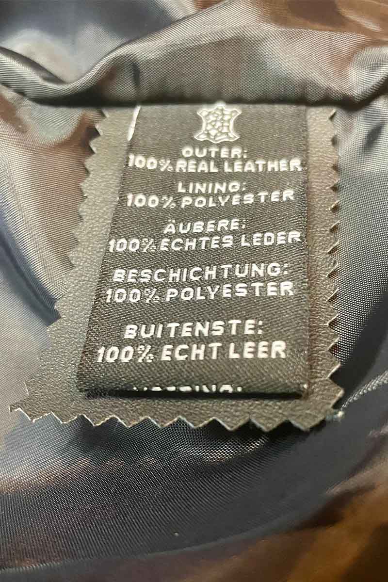 Tag inside leather moto jacket.