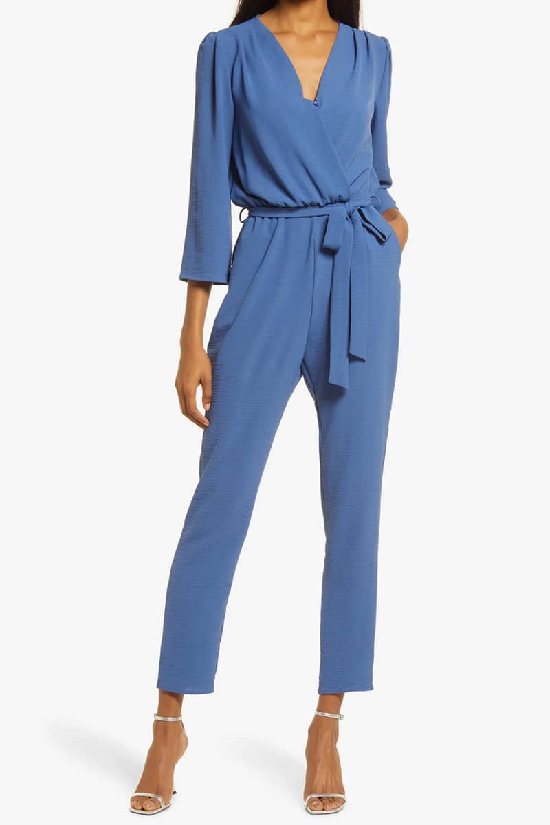 Model wears long-sleeved jumpsuit.