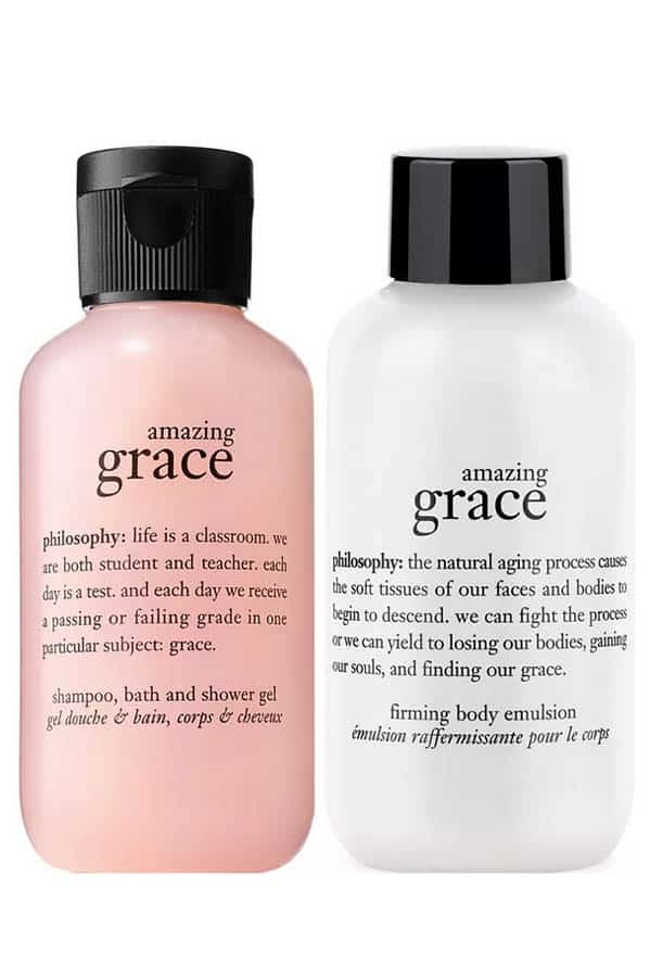 Set of two Philosophy bath care products on white background.
