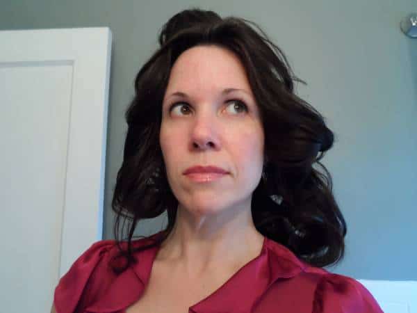 Step 3 of updo tutorial: release and twist 