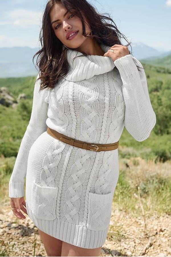 Model wears plus size sweater dress.