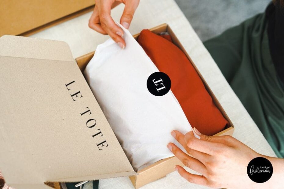 Top view of woman opening up a Le Tote branded box