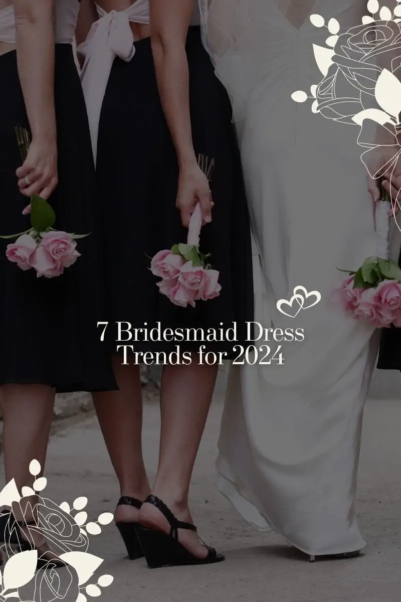 View from behind of bridal party wearing black dresses and bride.