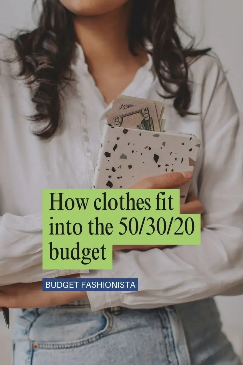 Close-up of woman holding folder with cash sticking out of it.